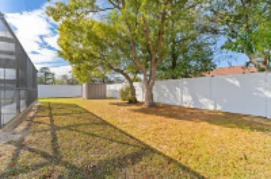 Charming 2-bedroom house with pool and fenced in backyard. Sleeps 8