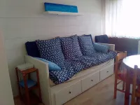 Studio with sleeping area for small family.
