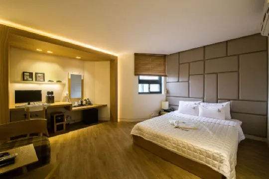 Busan Dadaepo Yuwol Отели рядом с достопримечательностью «Морской пляж Тадэпхо»