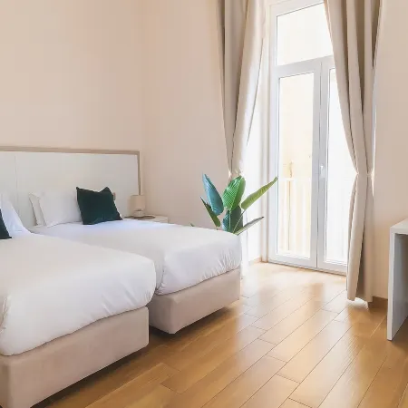 Musto Suites & Rooms Отели рядом с достопримечательностью «Неаполь - исторический центр»