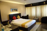 Jade Garden Hotel Hotels near Chamarajendra Academy of Visual Arts