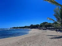 Costambar Ocean Breeze - Beachfront Apartment with Pool - Homestays