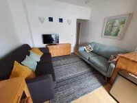 Seaside two bedroom flat with parking opposite path onto beach