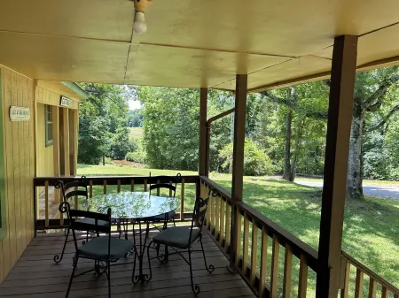Peaceful Hills Retreat’s cottage is clean and cozy with a creek on 97 acres