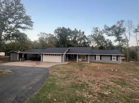 Waterfront house with boathouse, boat launch, outdoor kitchen, fire pit