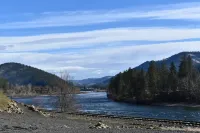 Modern log cabin with a cozy cabin feel along the Clearwater River.