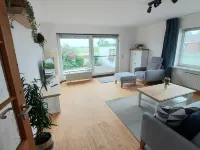Gemütliche Erdgeschosswohnung mit Terrasse Hotels in Westerdeichstrich