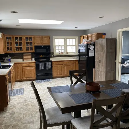 3 bedroom/2 bath home; close to EAA. Large kitchen and outside deck area.