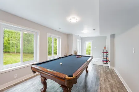 Beautiful and Private 6000 sqft waterfront home with private dock and hot tub!