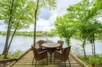Beautiful and Private 6000 sqft waterfront home with private dock and hot tub!