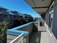 Grand Haven Family Getaway: Stylish Condo, Walk to Beach & Downtown