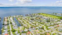 Cocoa Beach Coral Retreat waterfront 3 BR /2.5 BA