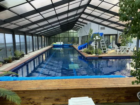 Charming Log Cabin Retreat with Flower Garden