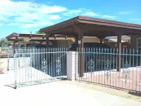 Secure carport, amazing Views and Reviews!  Private suite with patio.