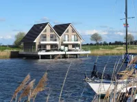 Pfahlhaus Perle am Yachthafen Carolinensiel Harlesiel ❤️, Living on the water Hoteles en Wittmund