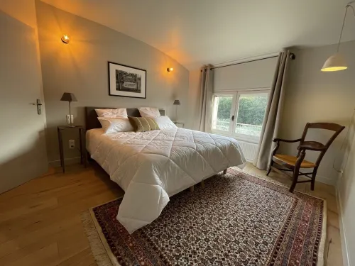 Provencal farmhouse on a hillside surrounded by centuries-old olive and oak trees