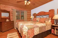 A Laurel Haven, with big porches and a log cabin feel. Fireplace.