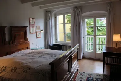 Lake Garda: Idyllic villa in quiet village center with olive and palm trees garden