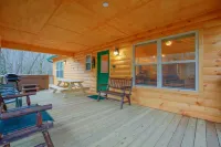 Log cabin nestled in the mountains and situated on Collett Creek