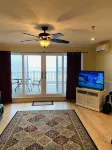 Spectacular Beachfront Condo-Watch sunrise from deck overlooking beach.