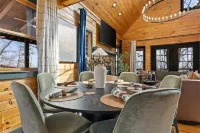 Escape to our luxe, pet-friendly Blue Ridge cabin—sleeps 14 with top amenities!