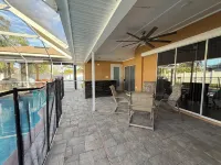 The Perfect Gateway Home with a large pool area, Gazebo, all fenced in.