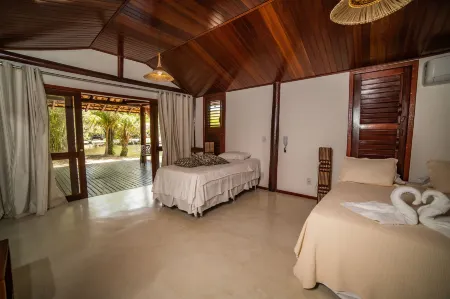 Vivant Eco Beach Oficial Отели рядом с достопримечательностью «Taipús de fora»