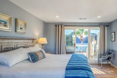 Golf and Lagoon Views with Screened Porch - Stunning Beach Retreat