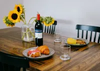 Modern Kitchen and Cozy Balcony - Inviting Urban Retreat Hotels near Terminal 1 Station