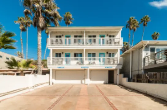 Stunning Ocean Views and Cozy Balcony - Charming Coastal Haven