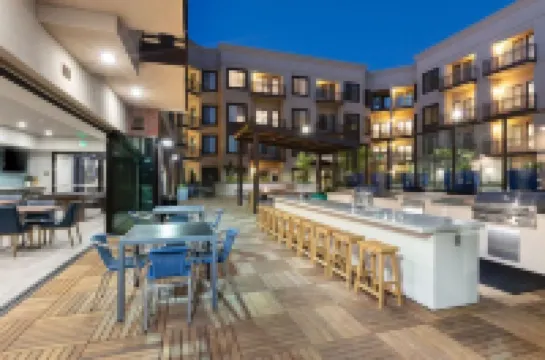 Resort Pool, Rooftop Deck, and Fitness Center - Elegant Oasis Hotels in Campbell