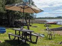 Charming 4-bedroom cottage ON Tawas Lake Pet, kid-friendly. Great Bird watching!