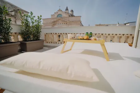 Cinquanta Sfumature Luxury Suites Отели рядом с достопримечательностью «Parrocchia Santa Maria di Monteverde»