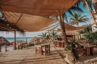 Petit Lafitte Beach Front Hotel & Bungalows