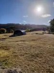 cosy cottage with wood heater, surrounded by bushland
