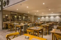 Tri Hotel Premium Criciúma - Bữa sáng