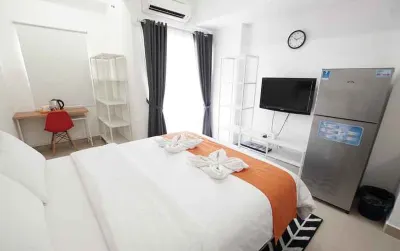 Apartemen 28 m² dengan 1 kamar tidur dan 1 kamar mandi pribadi di Kebon Jeruk Hotel dekat Taman Pintu Kampung Blok DD Palm Ganda Asri 2