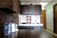 Simply Homey 2Br at 11St Floor Pinewood Apartment