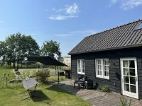 Rust en Ruimte in een Knusse Cottage aan de Lek Naast Werk aan het Spoel