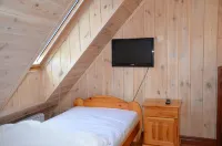 Dworek Mazurski Lizer Отели в г. 