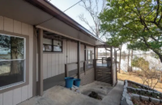 Charming waterfront home with beautiful panoramic views!!