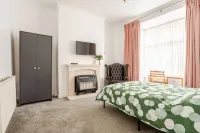 Charming Family Home in Bolton with Patio & Free Parking