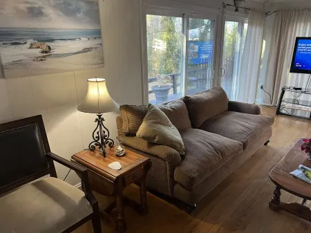 Cozy Cottage with access to and partially obstructed views of the bay.