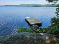Escape to Howie's Camp: Unwind and Recharge at This Lakefront Log Cabin