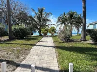 Chic 2-bedroom condo in brilliant Bimini Bay, steps from the Beach, WiFi, AC