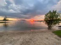 Waterfront condo with beach steps to Boyne City