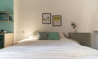 w Refined 1BR Steps From Milan s Cultural Core