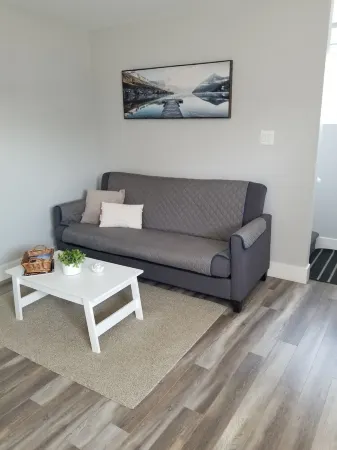 One bed apt w/ private bathroom (1) free charge (1) car parking.