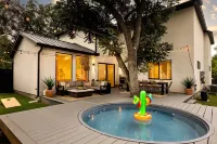 Modern Luxe South Lamar Retreat with Heated Pool, Game Room, and Outdoor Theater