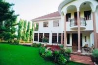 Kilimanjaro Pazuri Villas Отели в г. 